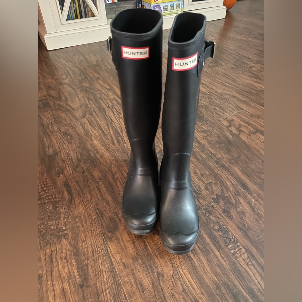 Hunter rain boots.